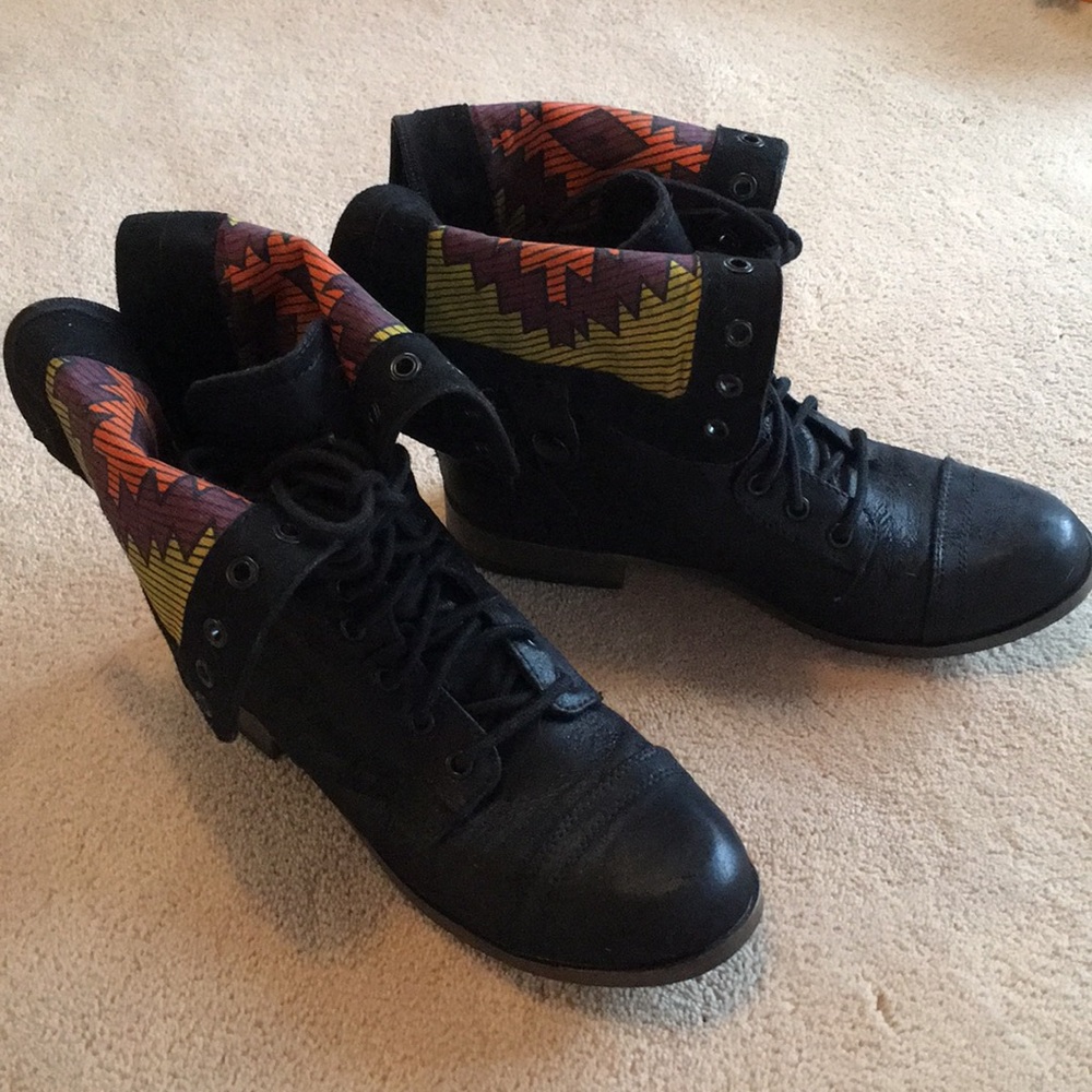 Black boots with tribal print inset